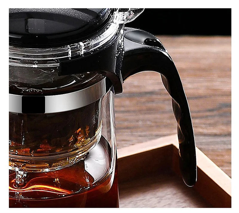 "Heat-Resistant Glass Teapot with One-Click Filter – Tea and Water Separation, Perfect for Tea and Coffee Brewing"